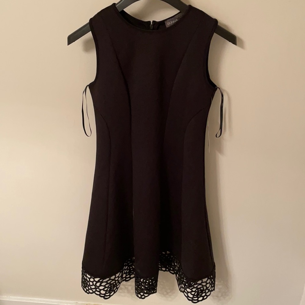 NEW black dress with sleek form fitting design